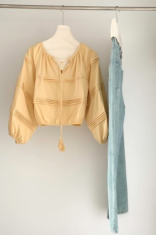 Keith Puffy Tassel Top in Yellow